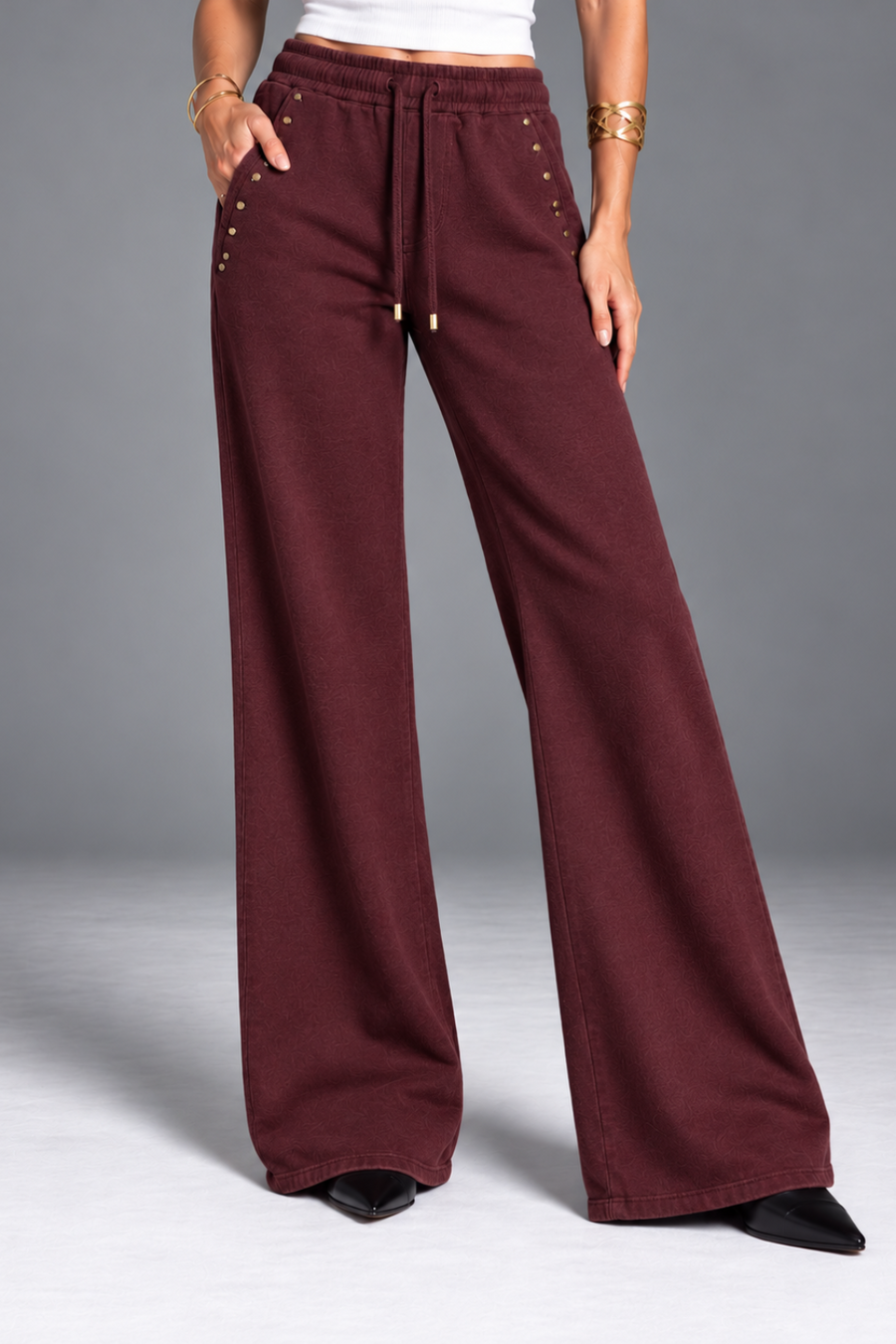 CALÇA WIDE LEG COM SPIKES